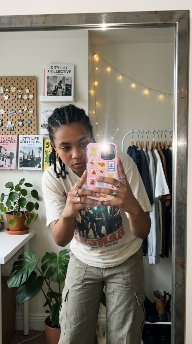 Fishy Mail case in a mirror selfie at home